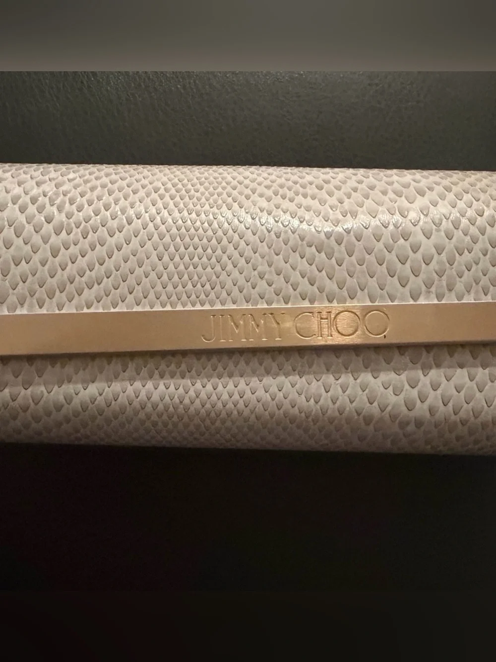 Jimmy Choo Pale Pink Snake-Embossed Clutch with Gold Logo Bar